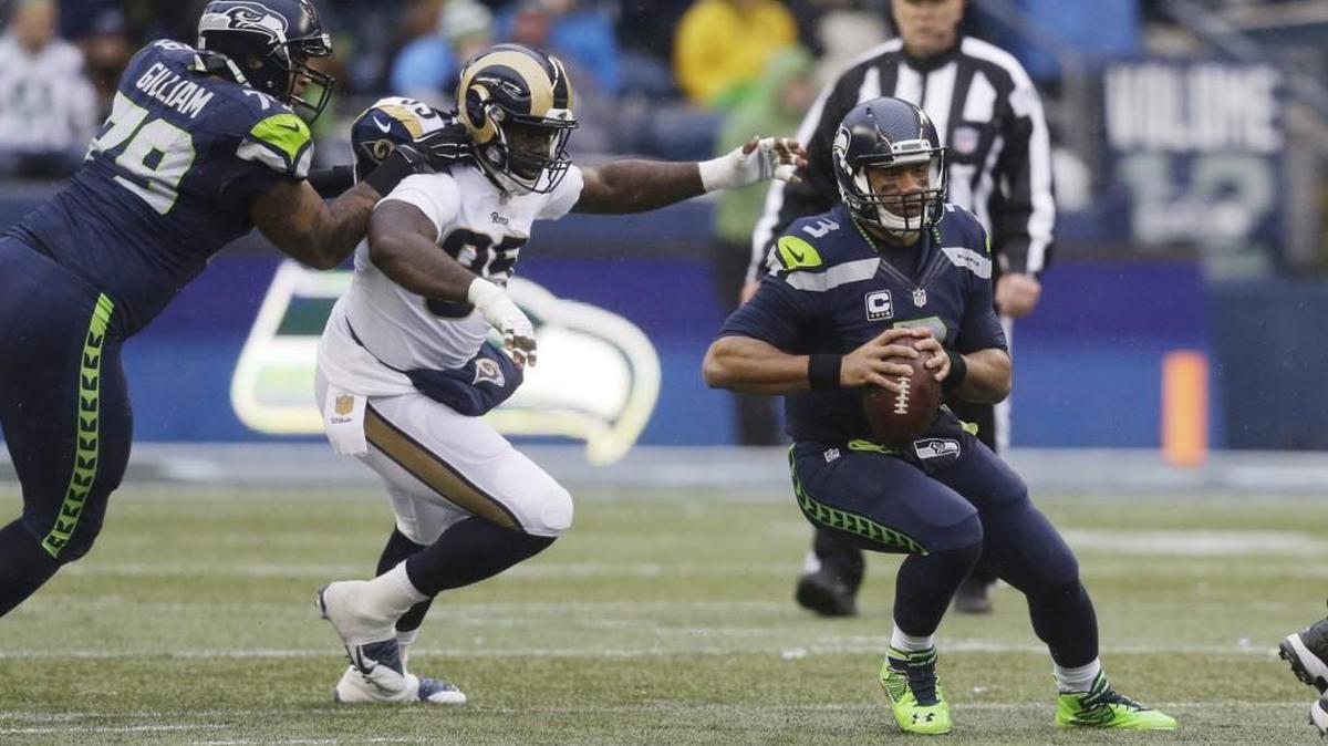 Seattle Seahawks quarterback Russell Wilson (3) in action against the St. Louis Rams in the first half of an NFL football game, Sunday, Dec. 27, 2015, in Seattle.