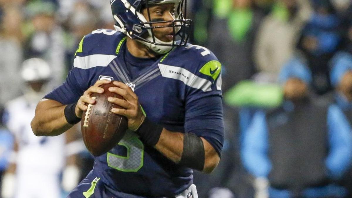 Seahawks quarterback Russell Wilson is now seventh in the NFL in annual average contract value for a quarterback, at $21.9 million per year. That’s after Friday’s agreement between Derek Carr and the Oakland Raiders for a reported $125 million over five years.
