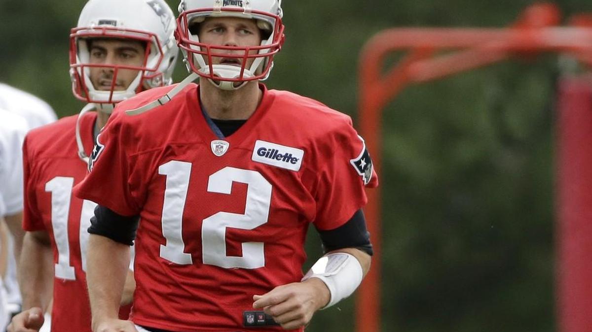 Patriots quarterback Tom Brady on Wednesday at New England’s practice in Foxborough, Mass.