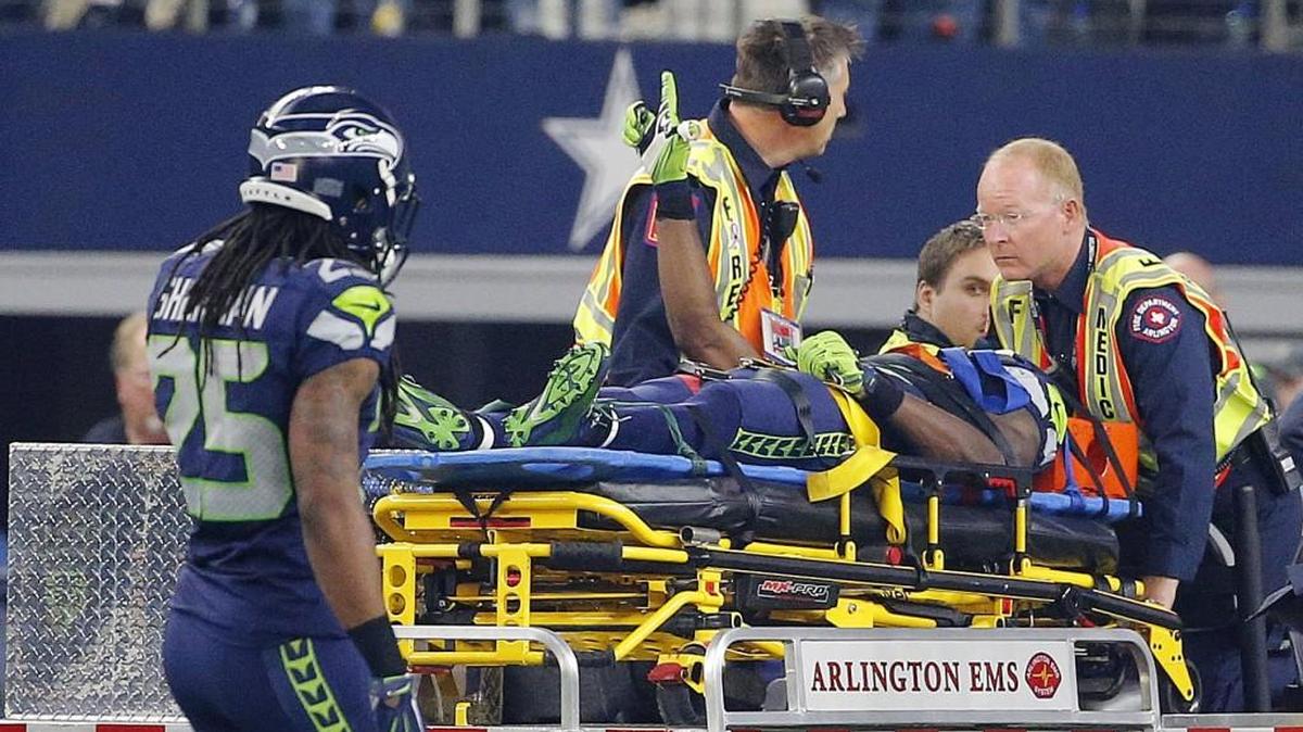 Seahawks wide receiver Ricardo Lockette gives a reassuring hand signal to teammates of “L” for “Love our Brothers” as he was stretchered out of AT&T Stadium in Arlington, Texas, on Sunday. He tweeted Thursday he’d been released from Baylor Medical Center in Dallas. Monday he had lengthy neck surgery there.