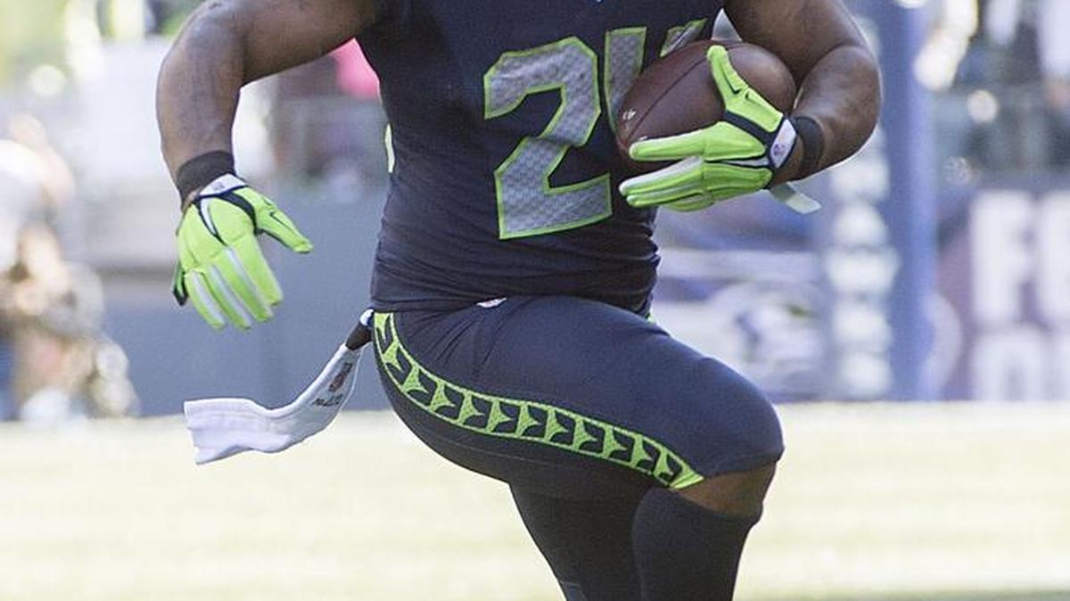 
Marshawn Lynch injured his hamstring on this catch and run in the second quarter of last week’s game against Chicago. The Seahawks learned of “some findings” from an MRI and list him as questionable for Monday night’s game against Detroit.
