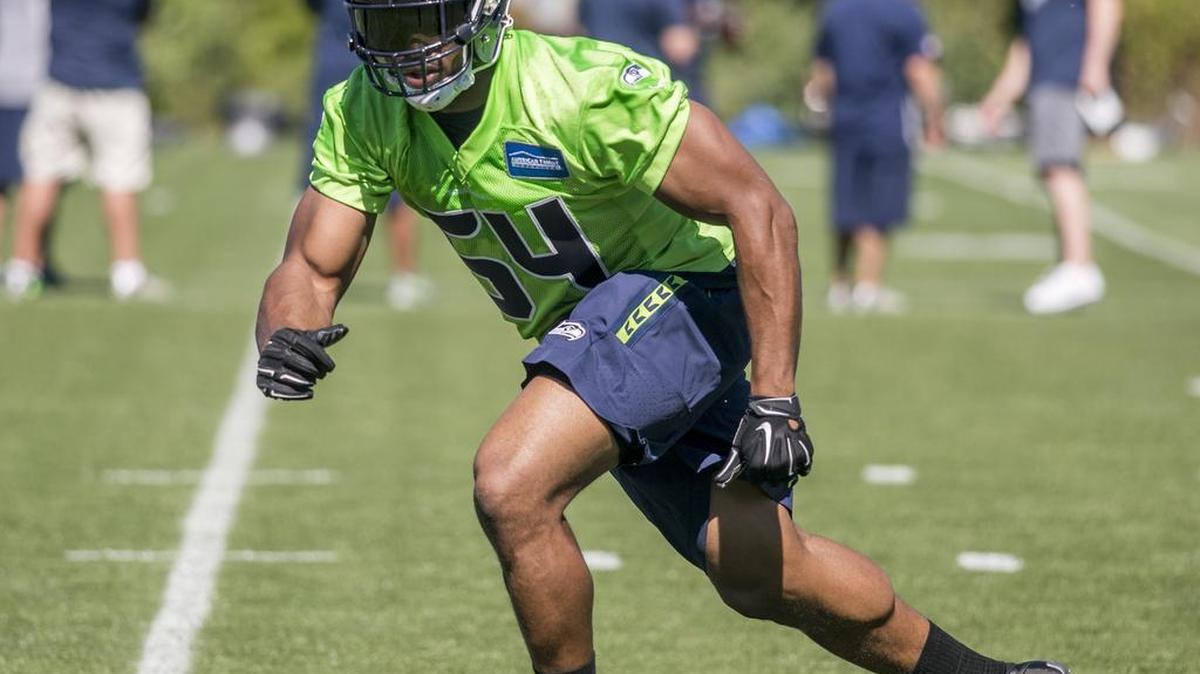 
Bobby Wagner, in drills during Friday’s first practice of Seahawks training camp in Renton, is due a contract extension that could pay the All-Pro linebacker up to $10 million per season. 
