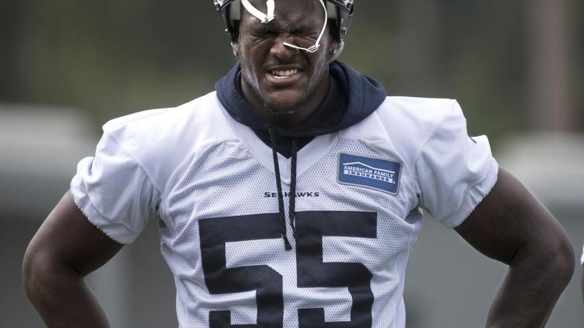 Frank Clark wore an ice pack on his lower right leg instead of practicing Monday in the Seahawks’ first drills of training camp in shoulder pads. Coach Pete Carroll thought Clark’s issue was “minor.”