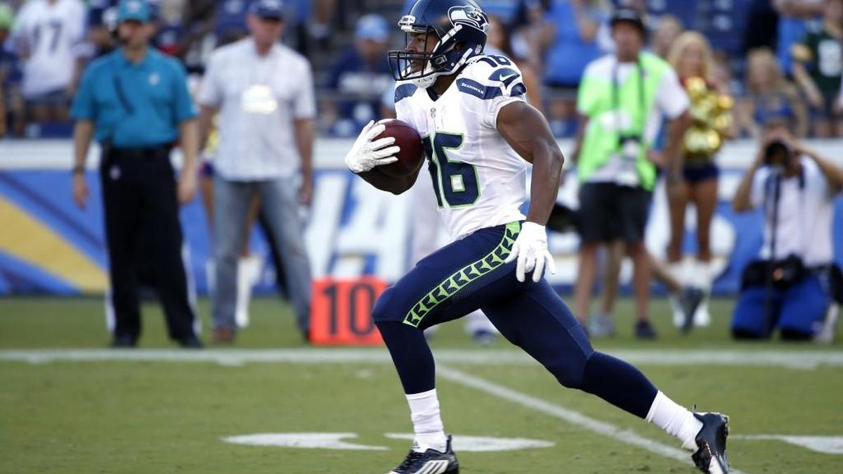 
Seattle Seahawks wide receiver Tyler Lockett returns a punt against the Chargers on Saturday in San Diego.
