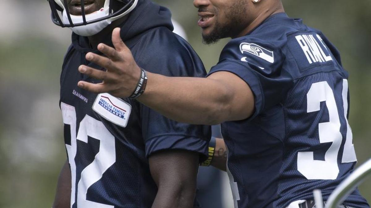Christine Michael (left) will start at running back, with Thomas Rawls (right) coming off the bench in the Seahawks’ opener today against Miami.