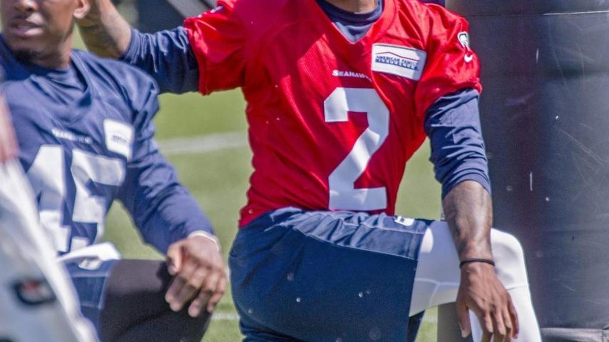 Seahawks rookie backup quarterback Trevone Boykin stretches at a minicamp practice in Renton last month. On Thursday, he avoided possible jail time in Texas.