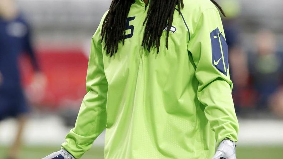Seahawks cornerback Richard Sherman warms up prior to Seattle’s regular-season finale Arizona Cardinals Sunday in Glendale, Arizona.