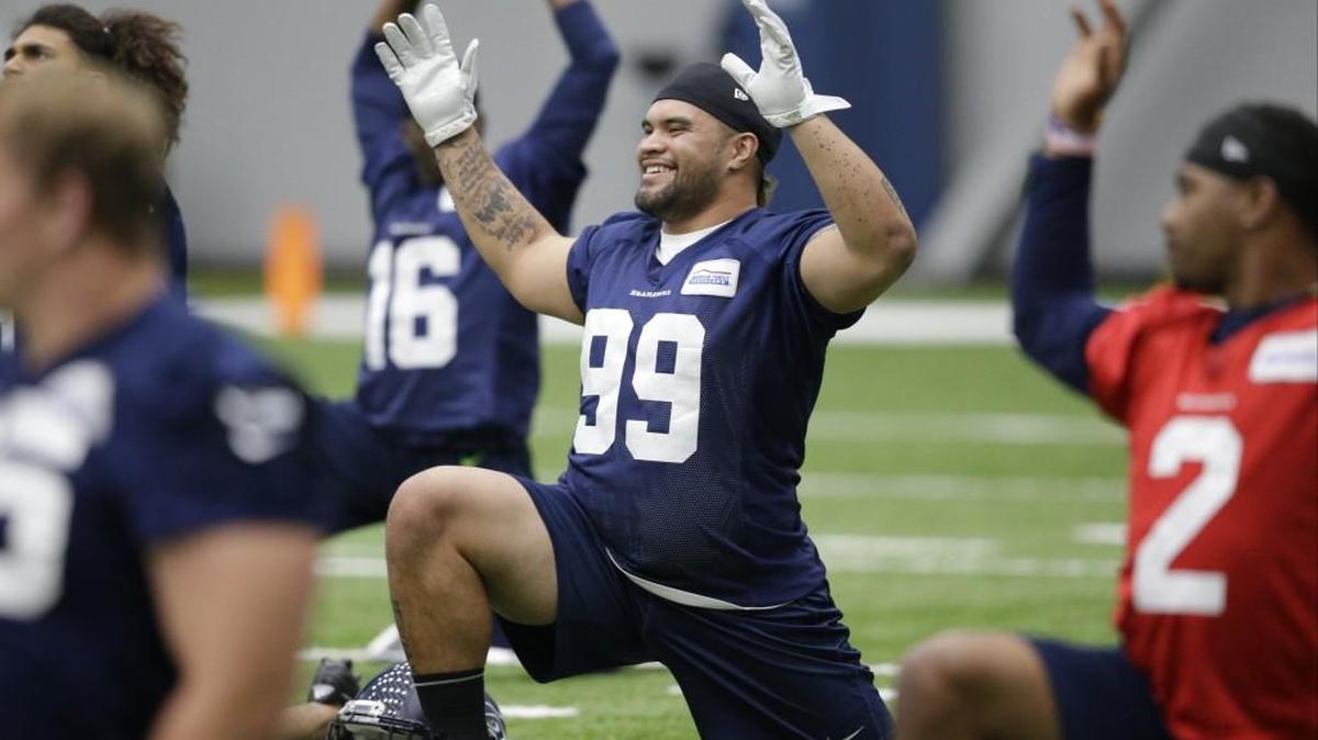 The Seahawks signed former Washington Huskies defensive lineman Taniela Tupou on Monday. He spent this past weekend’s rookie minicamp trying out as a 284-pound, No. 99-wearing fullback.