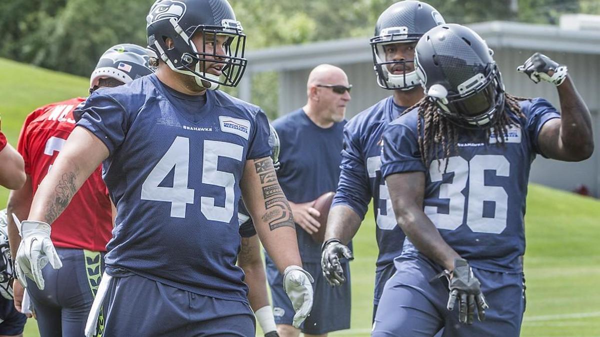 Former UW Husky defensive Taniela Tupou (45) returned to the Seahawks Monday as a fullback on the 53-man roster. The former Archbishop Murphy High School player north of Seattle fills the roster spot left open when safety L.J. McCray failed his trade physical.
