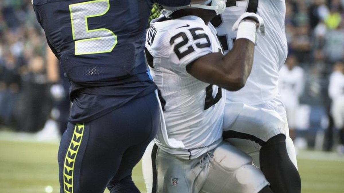 
The Seahawks on Tuesday waived wide receiver and former third-string quarterback B.J. Daniels, here playing against Oakland in the final preseason game in August. 
