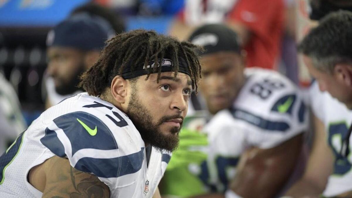 Garry Gilliam (79) seems to be looking for answers during the second half of the Seahawks’ loss at the Tampa Bay Buccaneers on Nov. 27. Gilliam lost the starting job at right tackle he had for two seasons that day after just three snaps. Saturday against Arizona, he gets that job back.