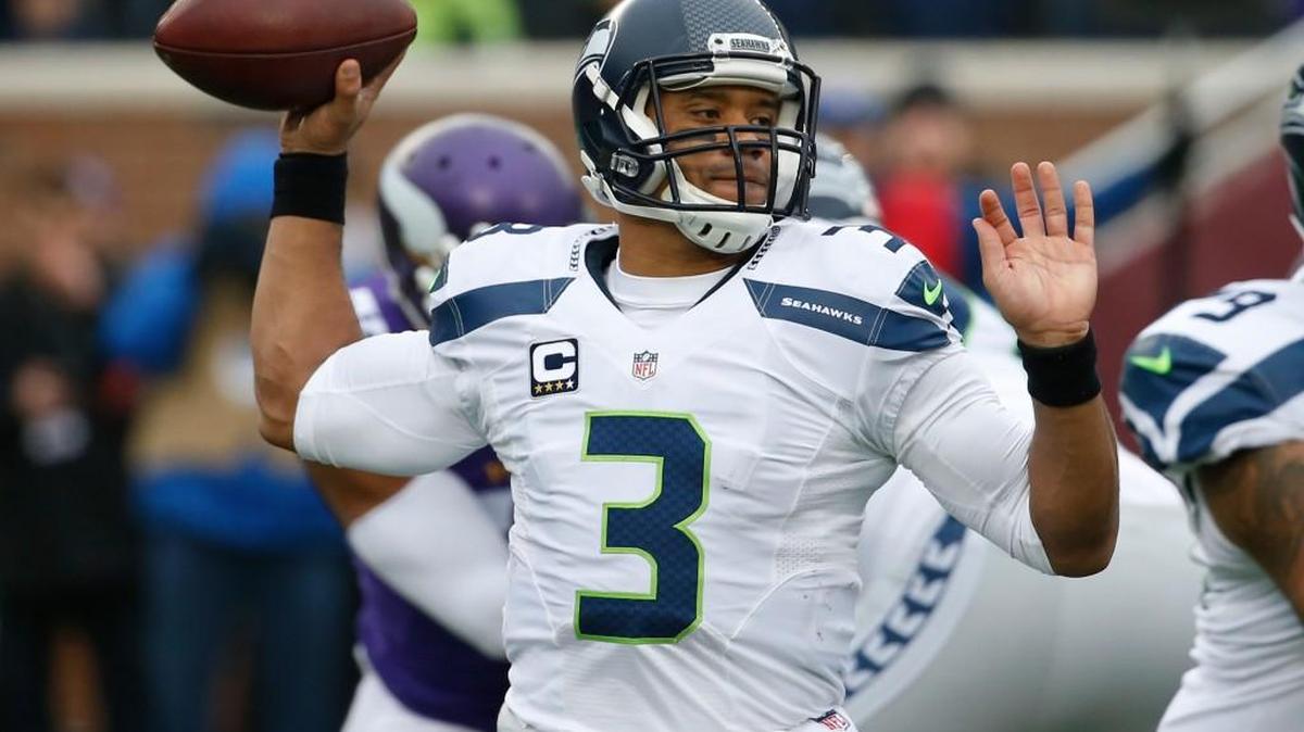 Seattle Seahawks quarterback Russell Wilson (3) throws against the Minnesota Vikings in the first half of an NFL football game Sunday, Dec. 6, 2015 in Minneapolis.