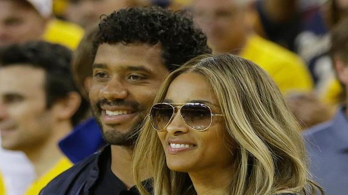 Seahawks quarterback Russell Wilson and Ciara, here at Game 7 of the NBA Finals in Oakland, Calif., last month, reportedly got married Wednesday at a 19th-century castle next to a forest in the English countryside.