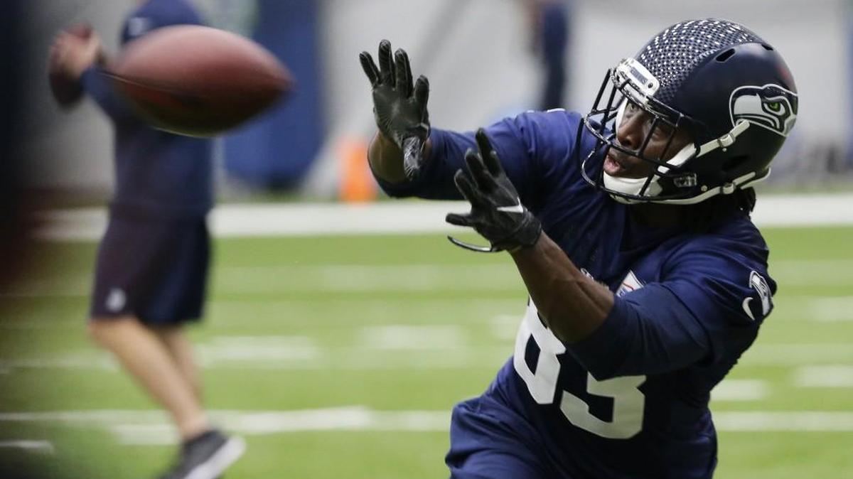 Seattle Seahawks wide receiver David Moore, making a catch in May at the team’s rookie camp, has impressed Doug Baldwin by showing good hands.