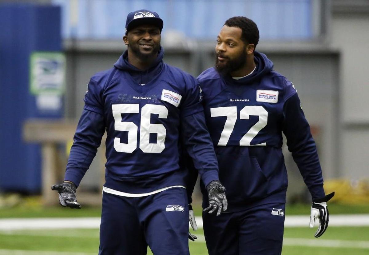 Pro Bowl defensive ends Cliff Avril (56) and Michael Bennett (72) hold the biggest key to the Seahawks’ attempt Saturday at Atlanta to advance to their third NFC title game in four years. They must affect soaring Falcons quarterback Matt Ryan.