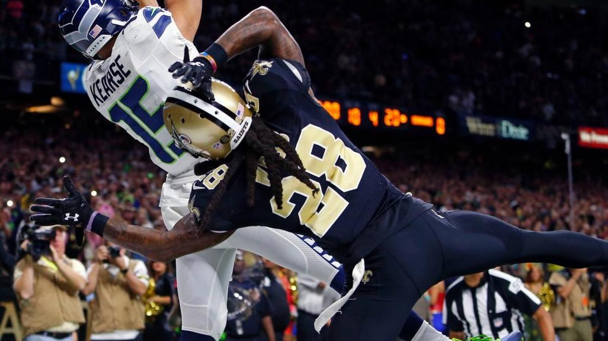 Seattle Seahawks wide receiver Jermaine Kearse (15) leaps for a pass just outside the end zone as New Orleans Saints cornerback B.W. Webb (28) covers as time expires Sunday in New Orleans, Sunday. Kearse came down out of bounds and the Saints won 25-20.