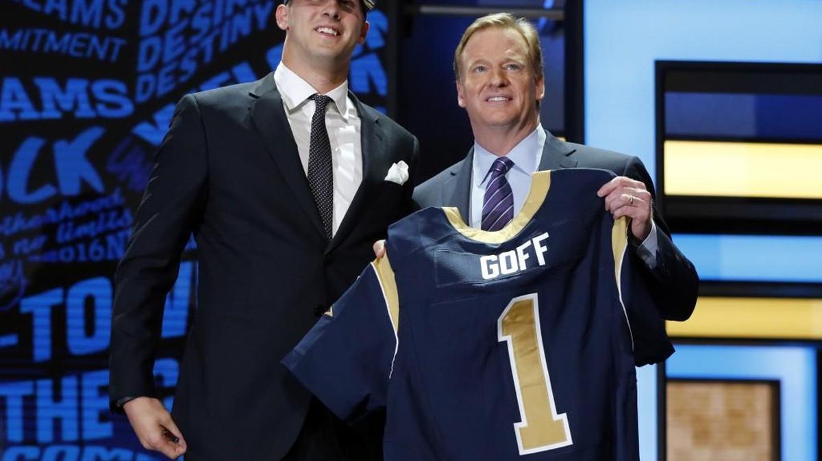 California’s Jared Goff poses for photos with NFL commissioner Roger Goodell after being selected by the Los Angeles Rams as the first pick in the first round of the 2016 NFL football draft, Thursday, April 28, 2016, in Chicago.