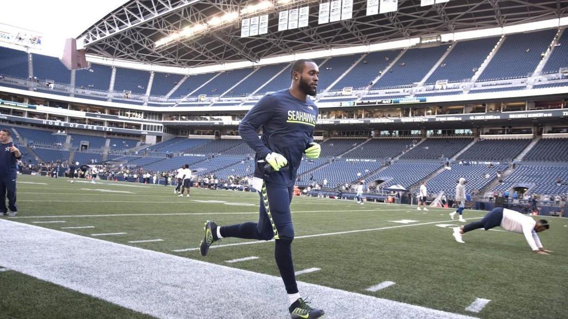 Seahawks safety Kam Chancellor warms up before going head to head, literally, with Dallas rookie running back Ezekiel Elliott in Thursday night's preseason game at CenturyLink Field.