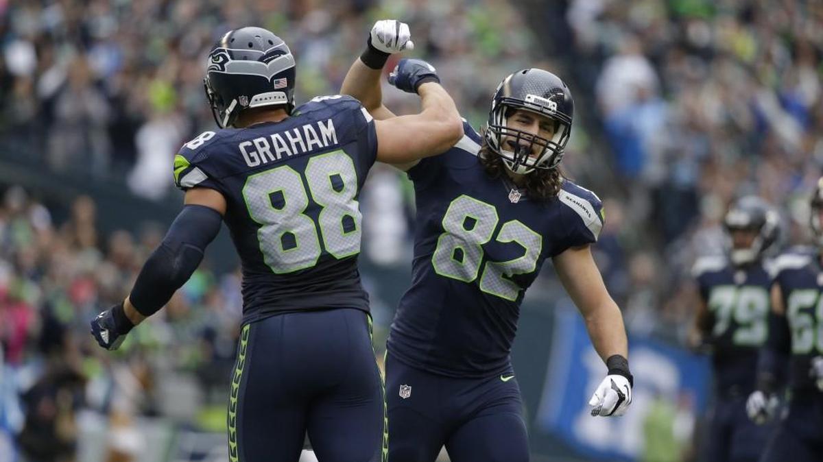 Seattle’s Luke Willson (82) will step in and try to replicate the production of Jimmy Graham (88), who was placed on season-ending IR after tearing his patellar tendon against the Steelers.