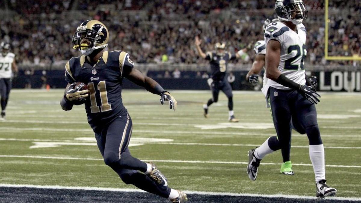 
Communicating throughout the secondary — including by Seahawks cornerback Cary Williams (26) — will help limit scoring plays like the one to Rams receiver Tavon Austin (11) during the Seattle’s 34-31 overtime loss last Sunday in St. Louis.
