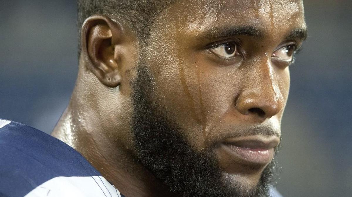 Sweat rolls off Seattle safety Kam Chancellor's face as he answers questions after the game. Photo taken in Seattle on Monday, Oct. 5, 2015.