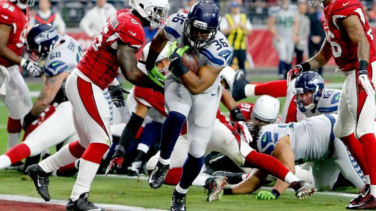 Seattle running back Bryce Brown (36) scores a touchdown in the first half against Arizona Sunday. The Seahawks’ offensive line opened run lanes all game.
