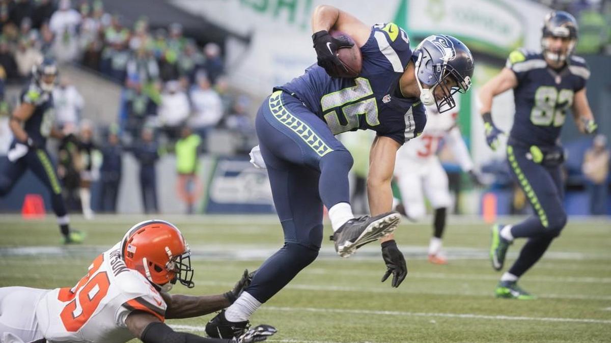 Seahawks wide receiver Jermaine Kearse had seven receptions for a career-high 110 yards Sunday, including converting four third downs on the day. Here he high steps out of a tackle attempt by Browns defensive back Tashaun Gipson.