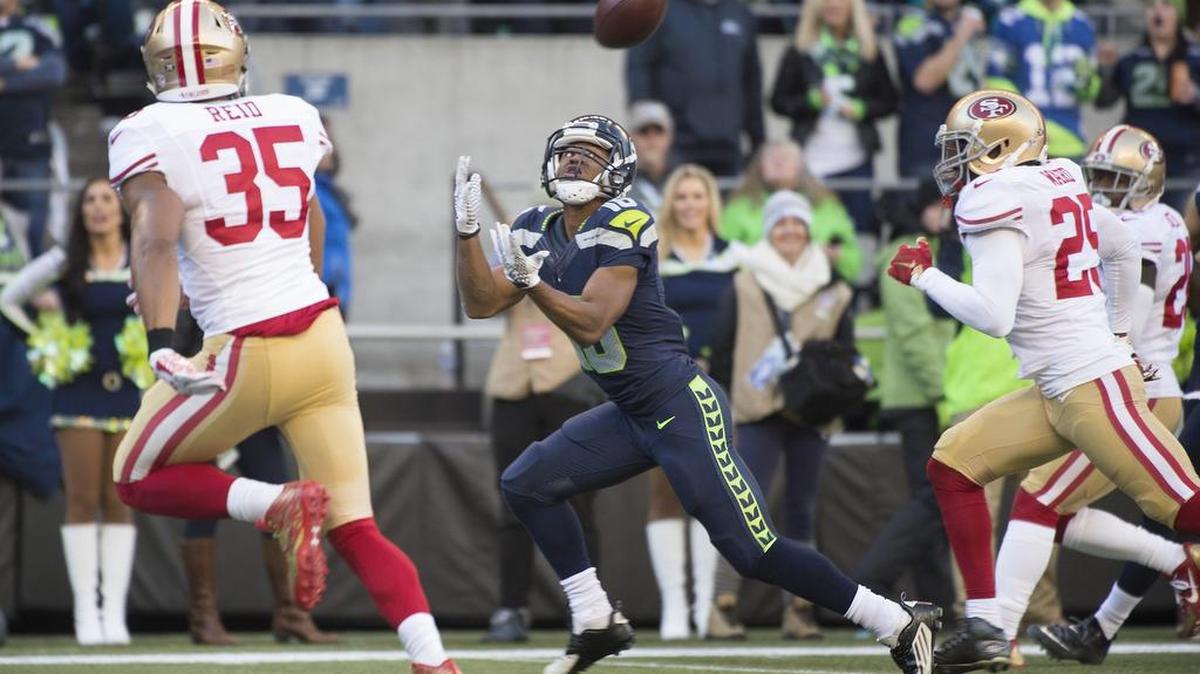 Seahawks receiver Tyler Lockett pulls in a 24-yard touchdown pass from Russell Wilson during the first quarter. Lockett also scored on a 11-yard pass in the second quarter.