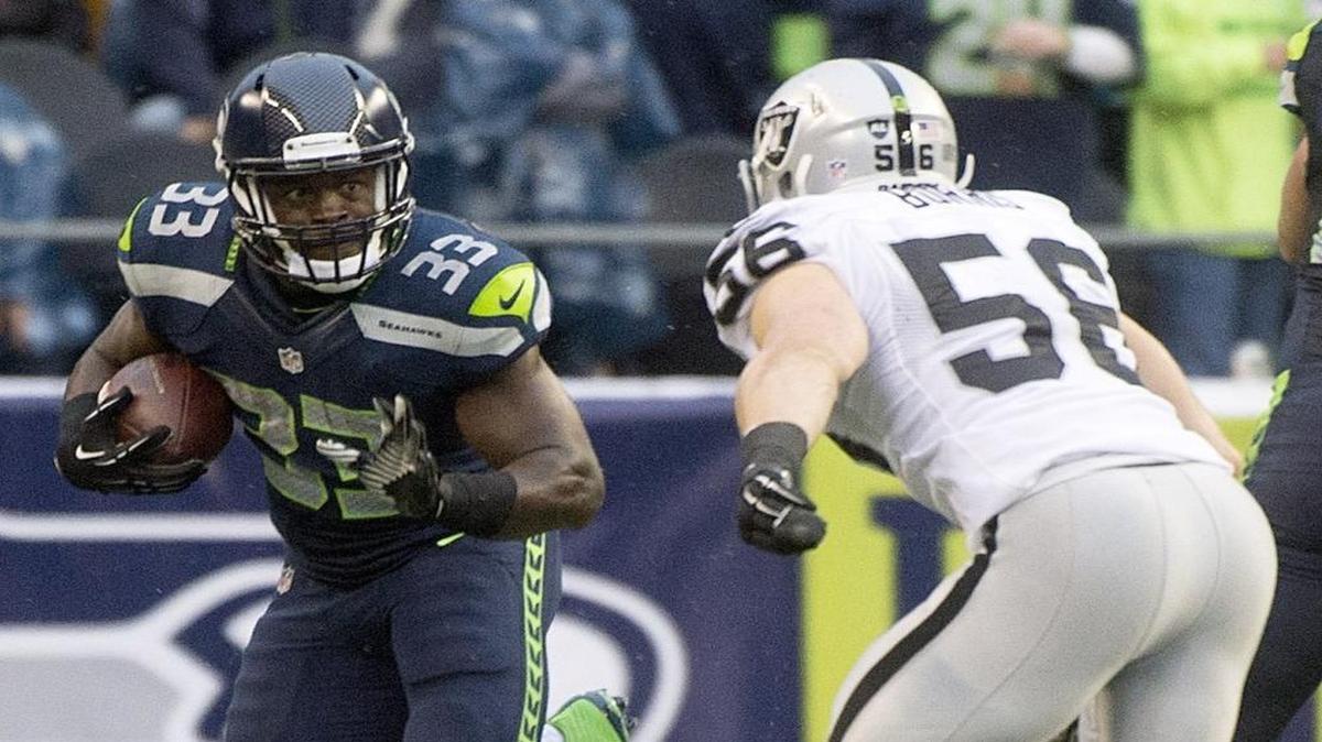 Seahawks running back Christine Michael, who was traded to Dallas in September, re-signed with the team Wednesday and could be the feature back down the stretch.