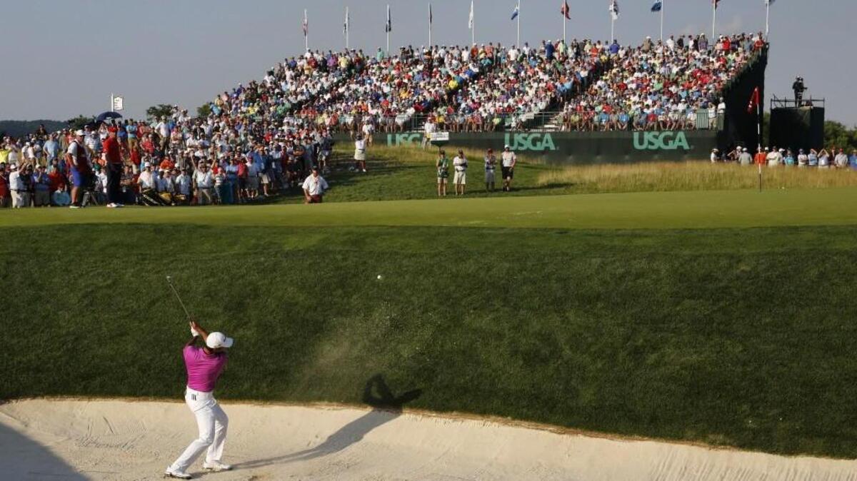 Jason Day hits out of the bunker on the 17th hole during the final round of the U.S. Open golf championship at Oakmont Country Club on Sunday in Oakmont, Pa.