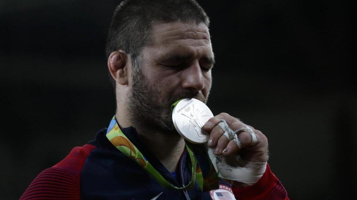 United States' Travis Stevens kisses his silver medal during the winners ceremony of the men's 81-kg judo competition at the 2016 Summer Olympics in Rio de Janeiro, Brazil, Tuesday.