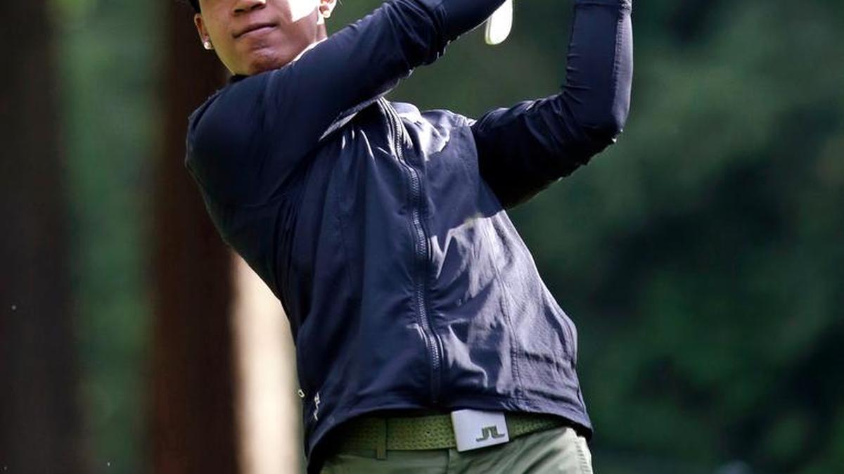 Sadena Parks watches her shot Thursday at Sahalee. The Bethel High grad and former UW standout had a 74.