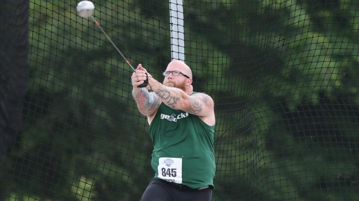 Evergreen’s Zeb Hoffman, a 37-year-old senior, is the defending NAIA national champion in the hammer throw.