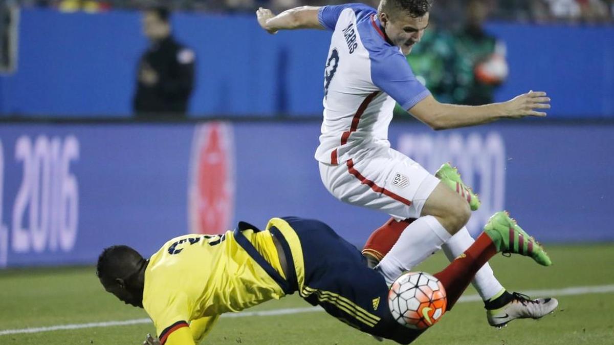 U.S. forward Jordan Morris (9) battles Colombia defender Yerry Mina (3) during the first half of an Olympic qualifying soccer match this past Tuesday in Frisco, Texas. The United States U-23 national team lost and was eliminated from qualifying for a spot in the Rio Olympics this summer.