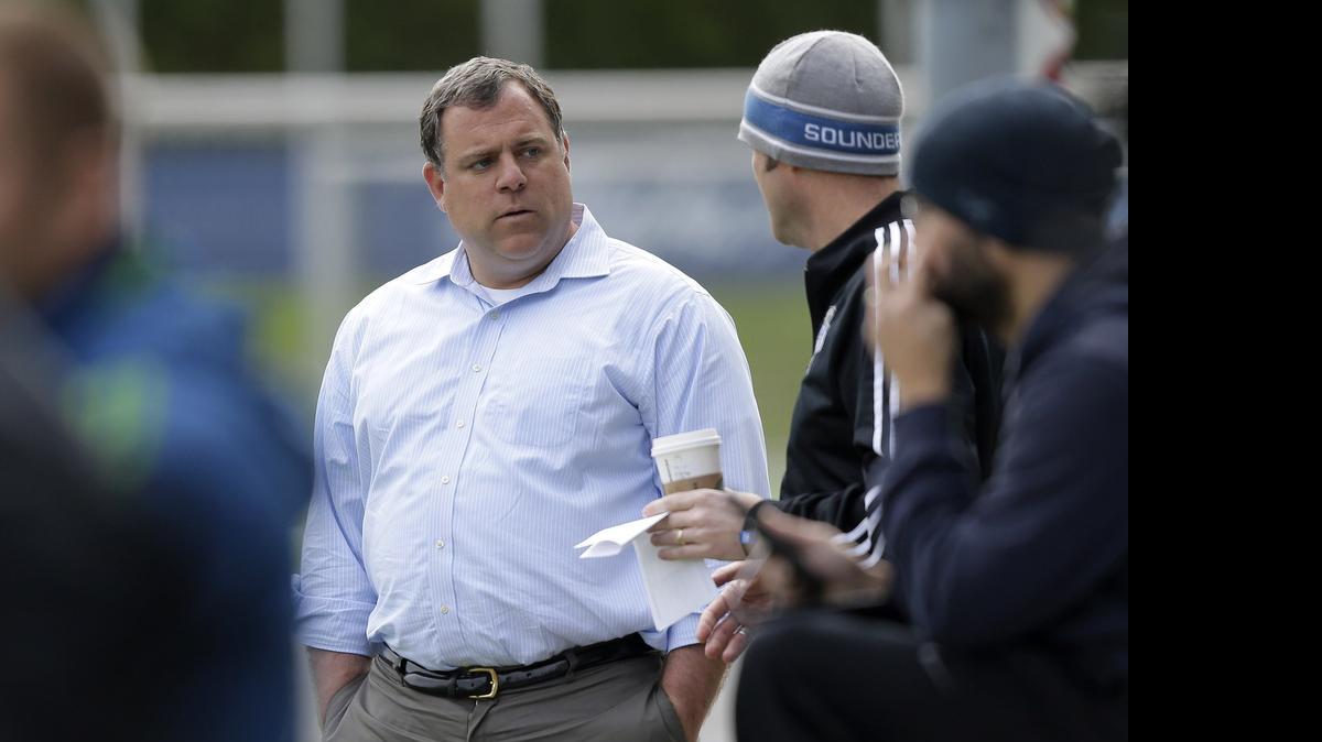 
Garth Lagerwey, center, the new general manager of the Seattle Sounders, considering roster moves. 
