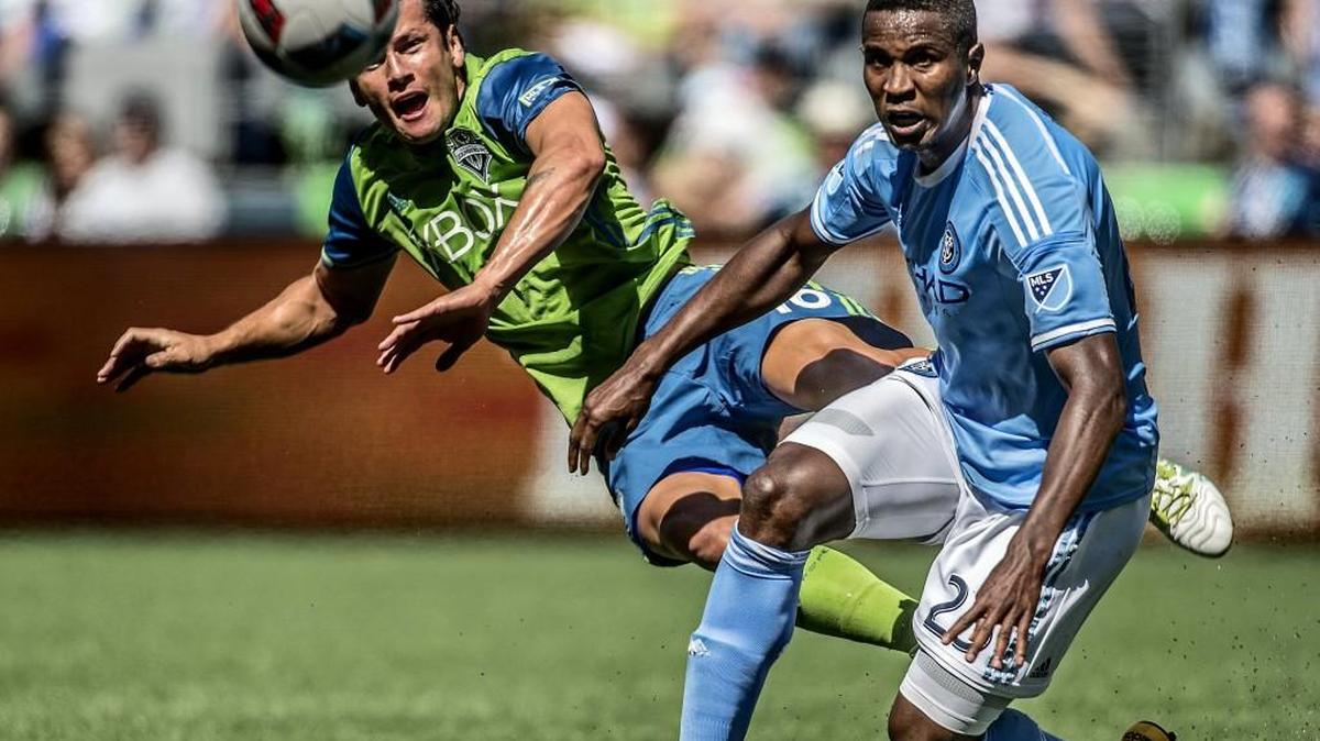 Sounders Nelson Valdez (16) battles for a ball in the midfield against New York City’s Ronald Matarrita (22), who scored the second goal in the 87th minute for the visitors, in Seattle’s 2-0 loss on Saturday at CenturyLink Field. The Sounders have lost five of their past six Major League Soccer matches with four coming by shutout.