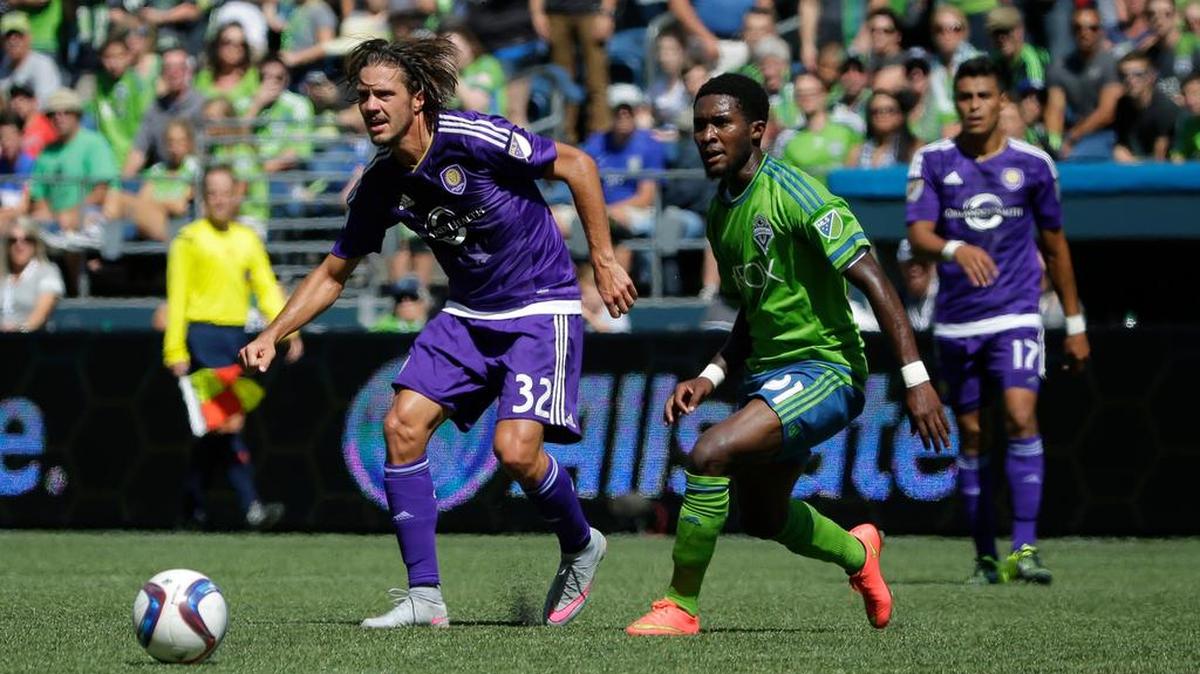 
Rookie defender Oniel Fisher, right, marking Orlando City's Adrian Winter, made his third career start for the Seattle Sounders on Sunday.
