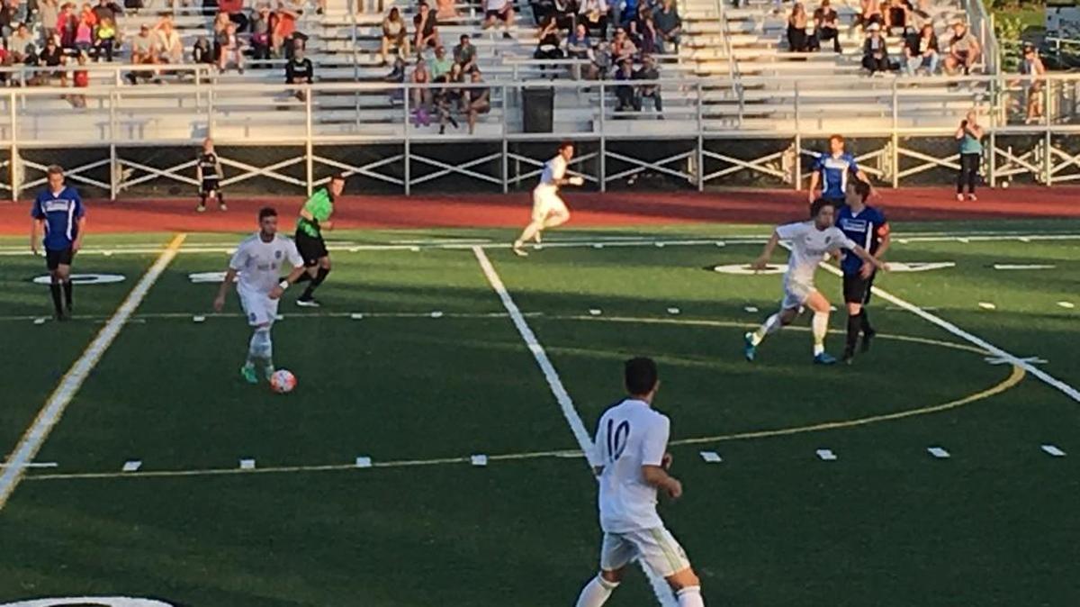 Sounders U-23, in white, shown in U.S. Open Cup action in Bonney Lake.