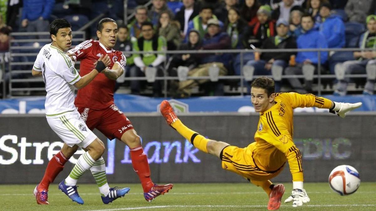 Seattle Sounders midfielder Gonzalo Pineda, left, has announced the end of his playing career.