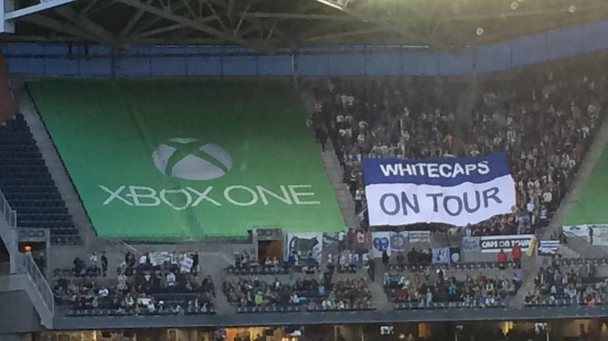 Traveling Vancouver supporters in northwest corner of CenturyLink Field for 2016 Cascadia Cup opener with Seattle Sounders.