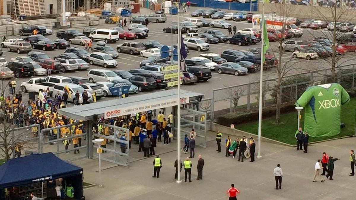 Club America supporters gather at the CenturyLink Field gate before watching the Mexcian side against the Seattle Sounders.