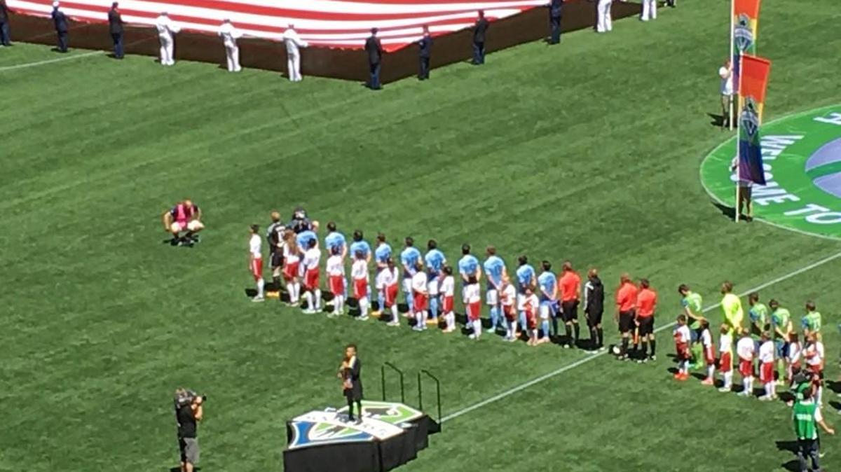 Vicci Martinez of Tacoma sings national anthem before Seattle Sounders home match against New York City FC.