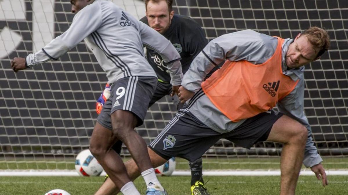 Seattle defender Chad Marshall (right), shown during Sounders training session, got the equalizing goal today in Houston.