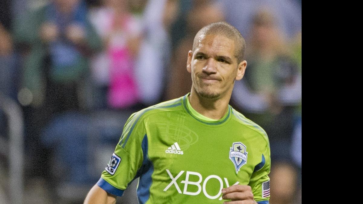 
Sounders midfielder Osvaldo Alonso is disappointed to miss a direct kick in the first period of a soccer match between Seattle Sounders and Chicago Fire at CenturyLink Field in 2013.
