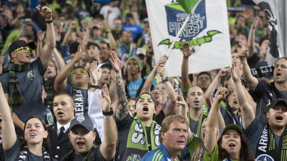 Cheers by Seattle fans after the soccer match between Seattle and Portland at Century Link Field in August 2013.