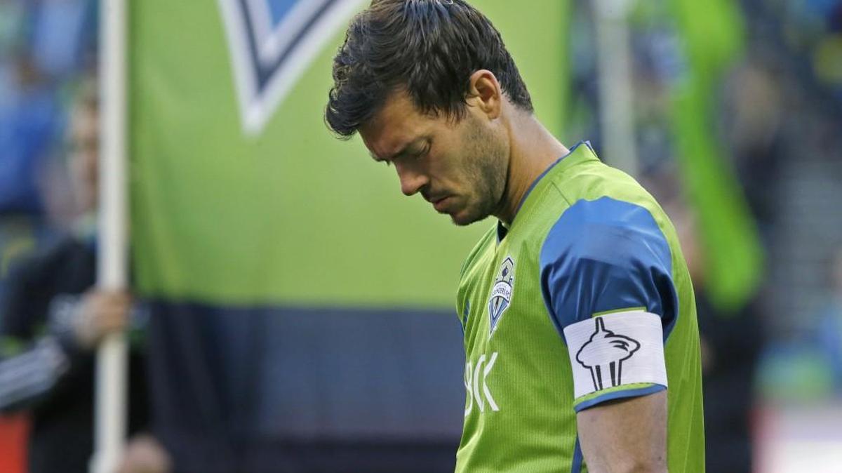 Seattle Sounders captain Brad Evans stands during the signing of the national anthem before an MLS soccer match against the Montreal Impact this month.
