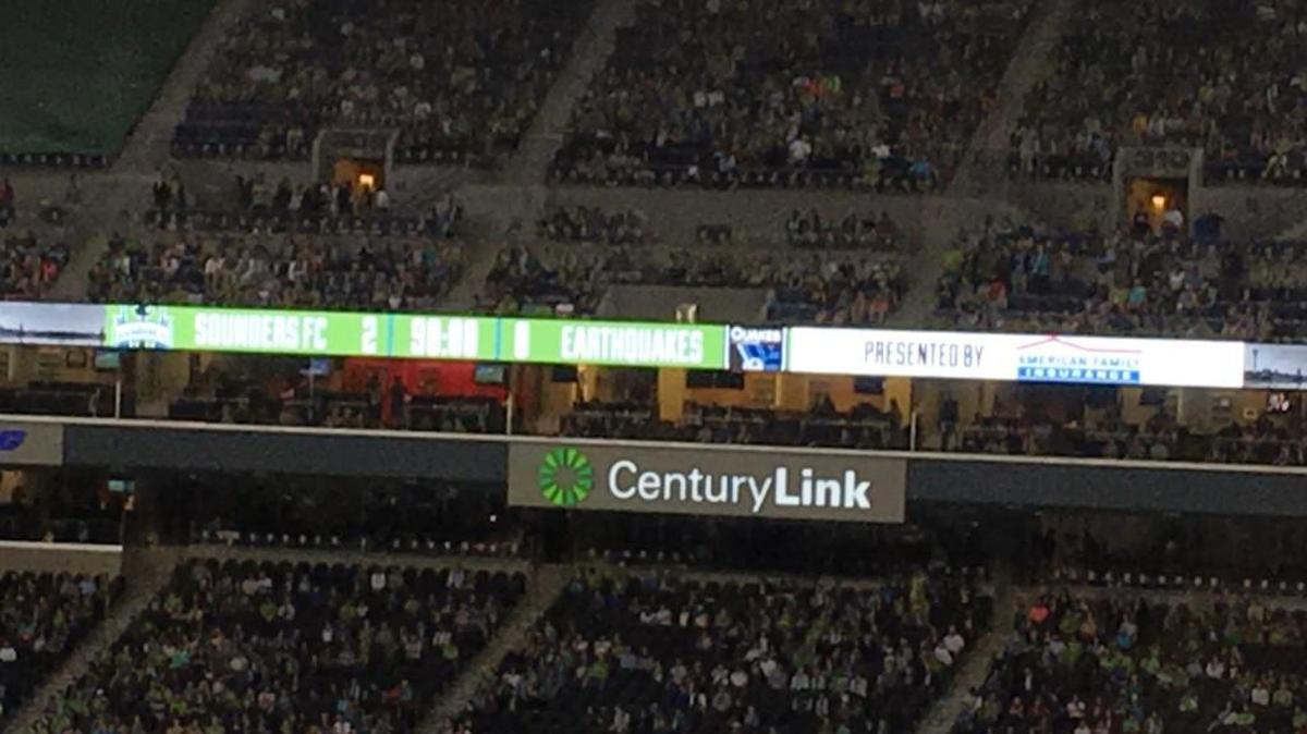 New CenturyLink Field reader board glows its first final score.