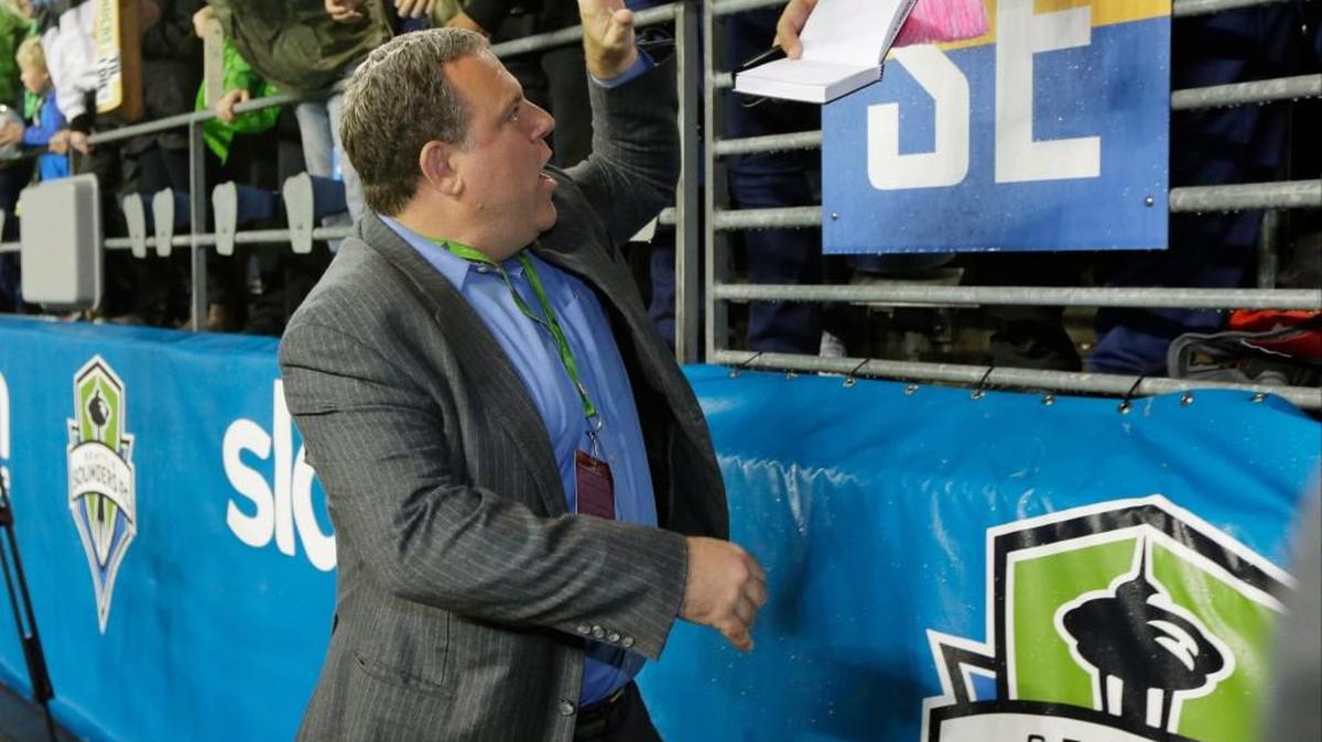 Seattle Sounders general manager Garth Lagerwey greets fans after the Sounders beat the Los Angeles Galaxy in an MLS soccer western conference knockout round playoff match.