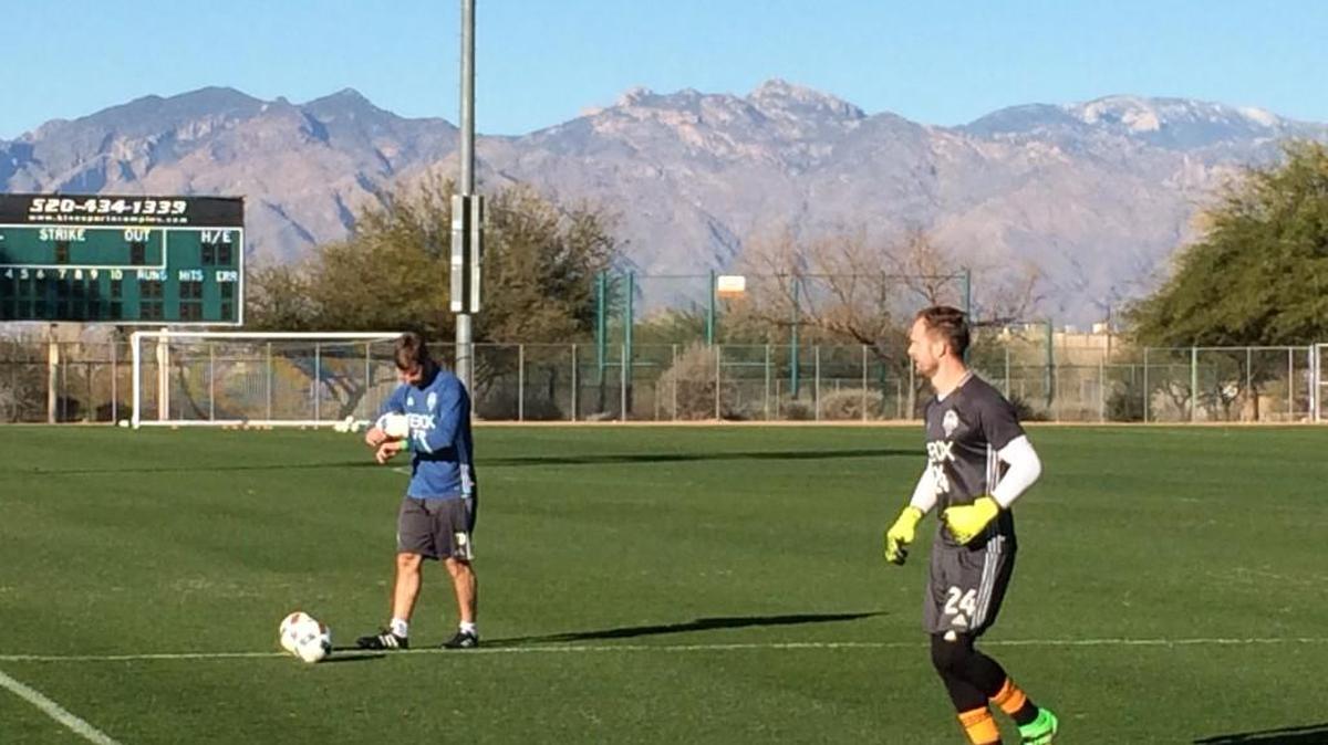 Goalkeeper coach Tom Dutra and starting keeper Stefan Frei prepare for Desert Friendly tonight against Vancouver.