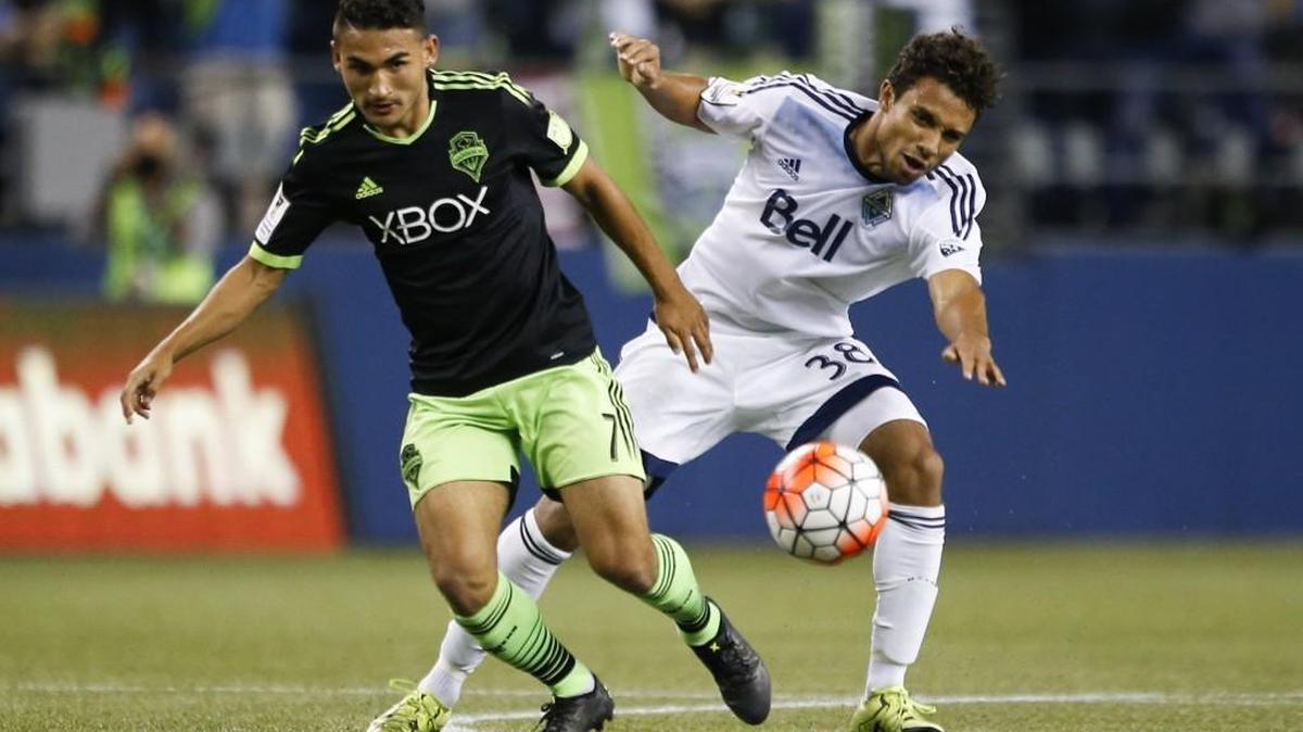 
Sounders midfielder Cristian Roldan and Vancouver Whitecaps midfielder Kianz Froese in CONCACAF Champions League soccer matchWednesday, won by Seattle, 3-0.
